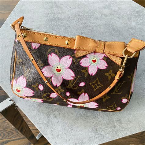 cherry blossom monogram pochette.